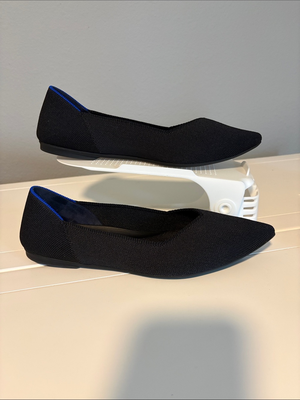 Rothy's Black Pointed Knit Flats with Blue Heel Trim